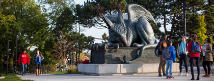 Students at the Gryphon Statue
