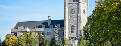 The front of Johnston Hall with a clear blue sky in the background