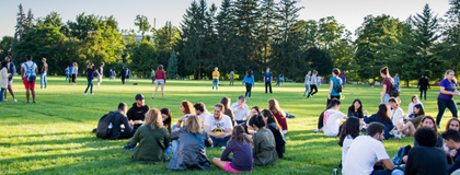 Students sitting on Johnston Green