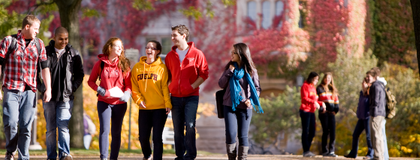6 students walking on campus at u of guelph